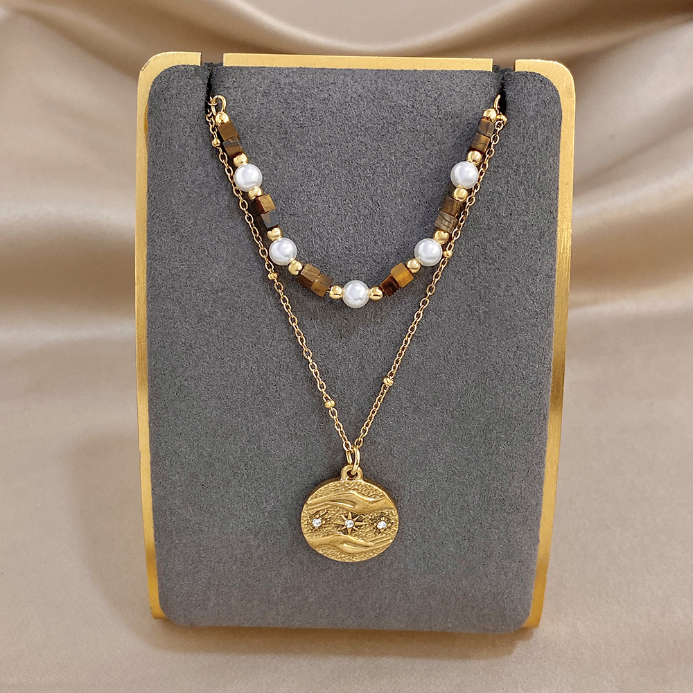 สร้อยคอประดับมุกไทเกอร์อายสไตล - Ethnic Fashion Co In บทวิจารณ์และราคา